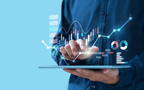 Businessman trading online stock market on teblet screen, digital investment concept